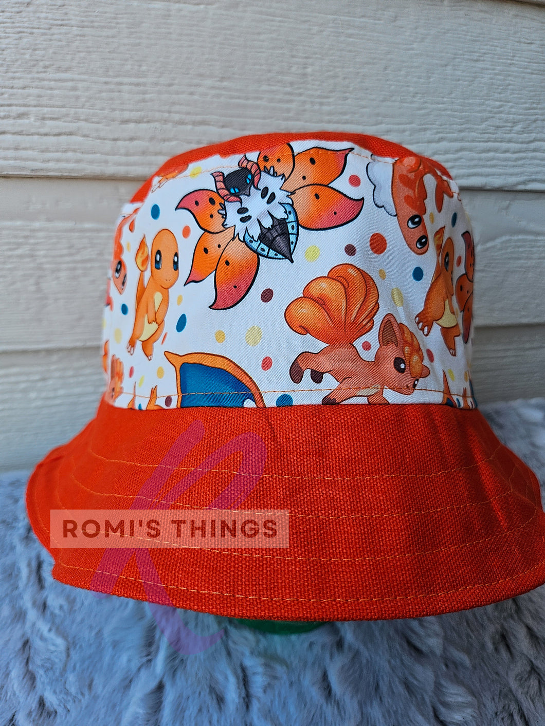 Orange Pocket Monsters - LARGE Bucket hat